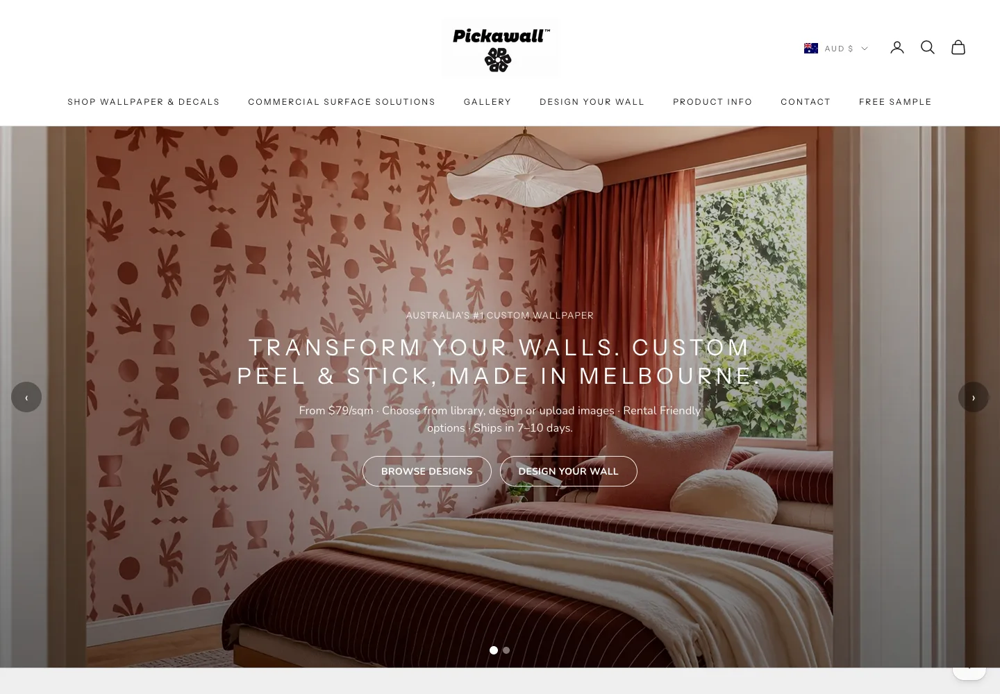 Pickawall homepage showing a custom wallpaper installation and links to browse designs or design a wall